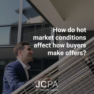 How do hot market conditions affect how buyers make offers?