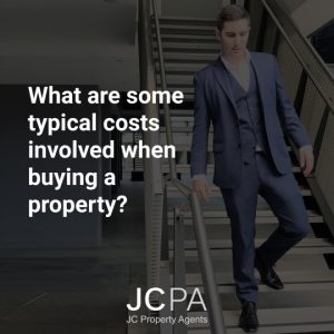 What are some typical costs involved when buying a property?